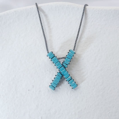 X Shape Faxul Turquoise Pendant