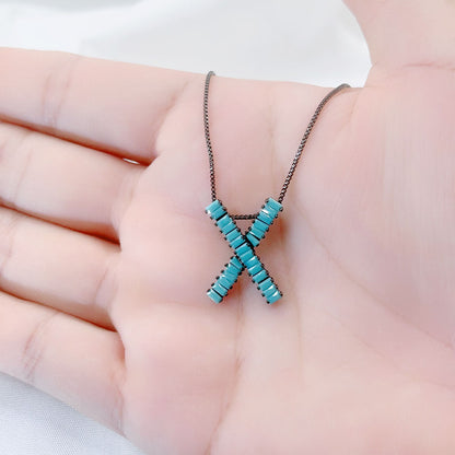 X Shape Faxul Turquoise Pendant