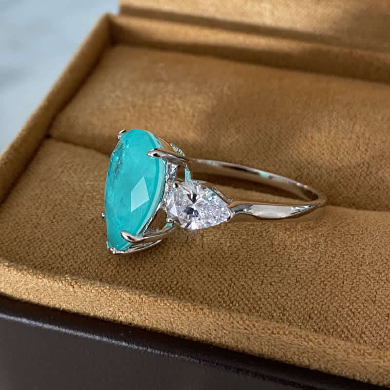 Paraiba Tourmaline With Zircon Drop Ring