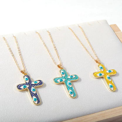 "We are protected" Evil Eye Cross Necklace