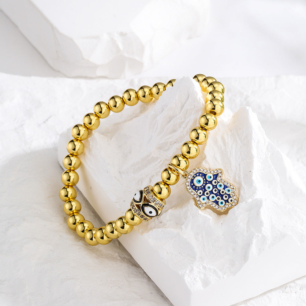 Halo Hamsa Pendant Golden Bead Bracelet