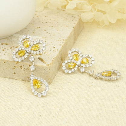 White Gold Iris Shape Yellow Sapphire Hollow Drop Earrings