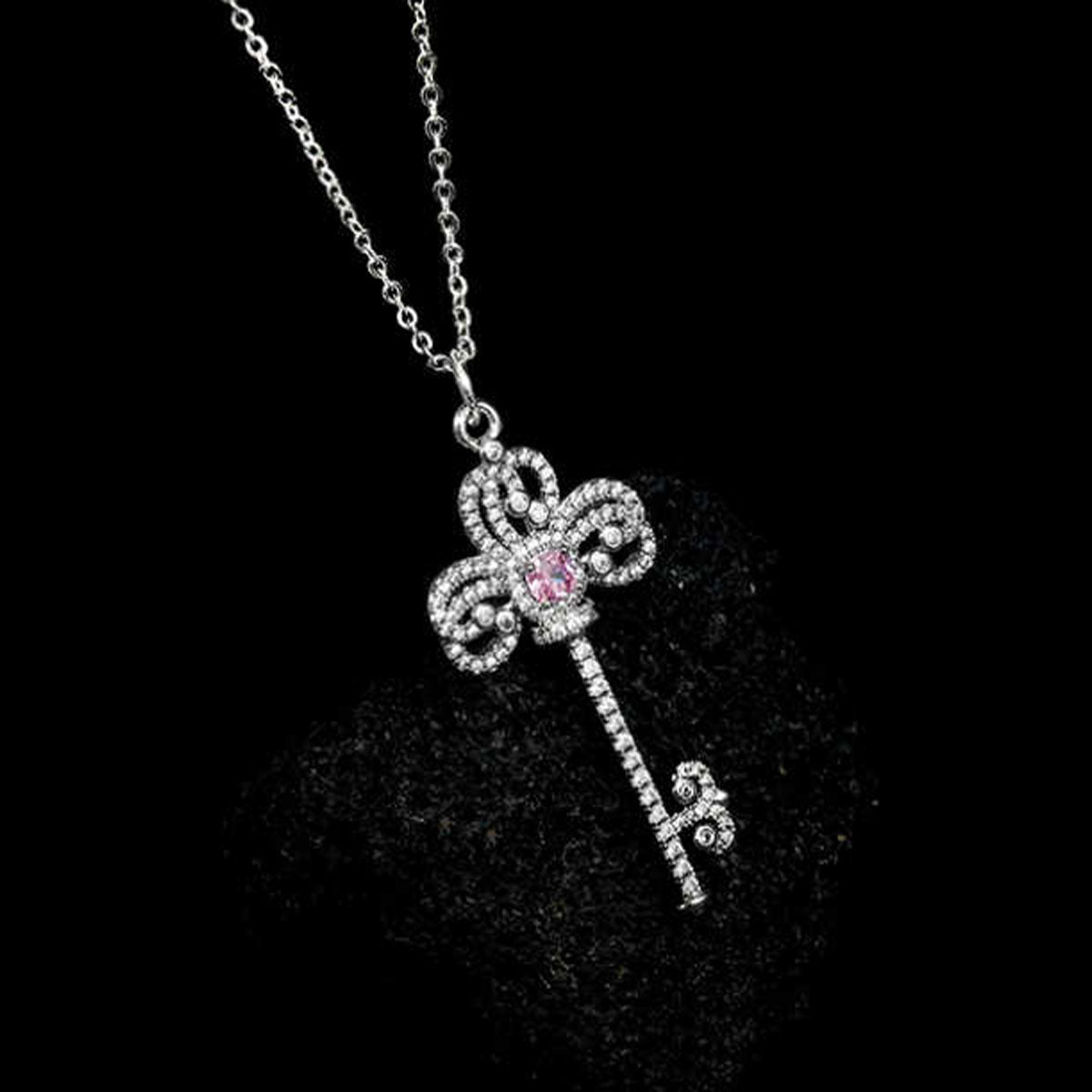 White Gold Classic Iris Key Shape Pink Sapphire Pendant