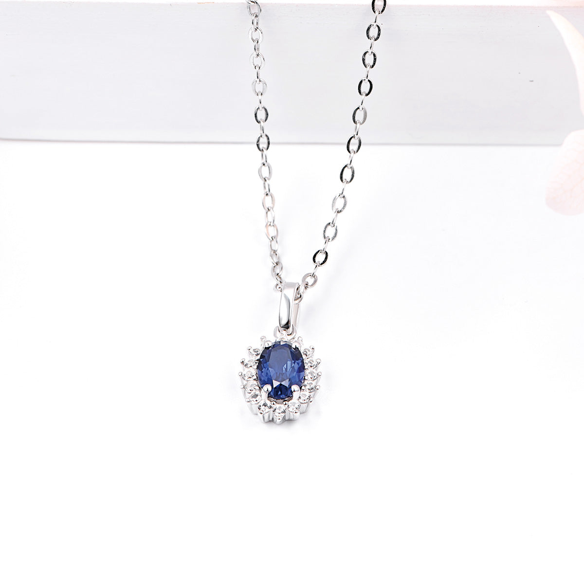 Sun Flower Shape Pendant with Oval Brilliant Cut Blue Sapphire