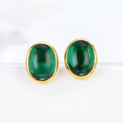 Golden Stud Earrings With Oval Emerald Gem