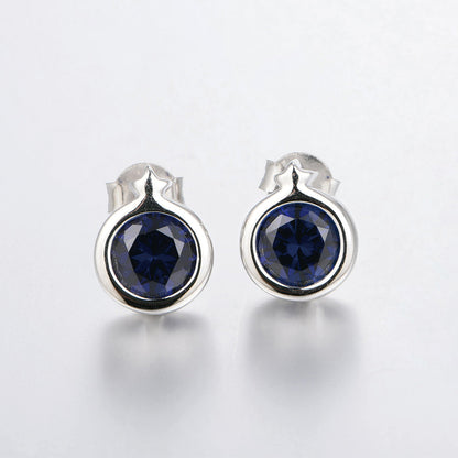 White Gold Round Stud Earrings With Blue Sapphire