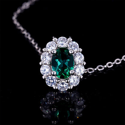 Oval Cut Emerald Halo Pendant Chain