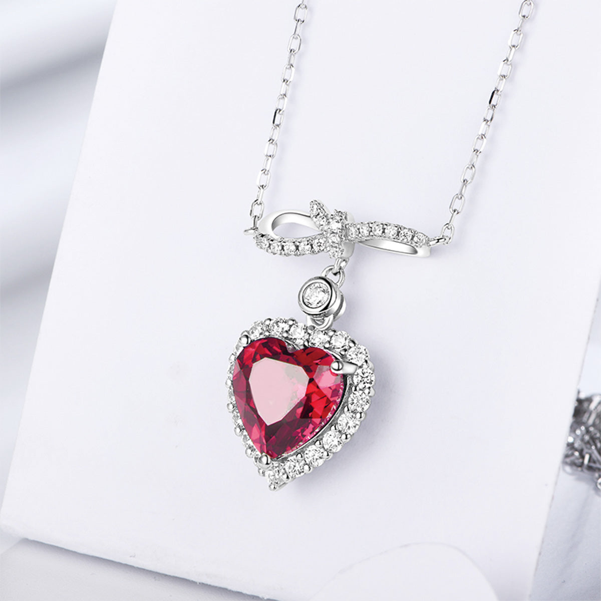 Bow-knot Heart Ruby Gem Pendant with Worldwide Setting Full Diamond