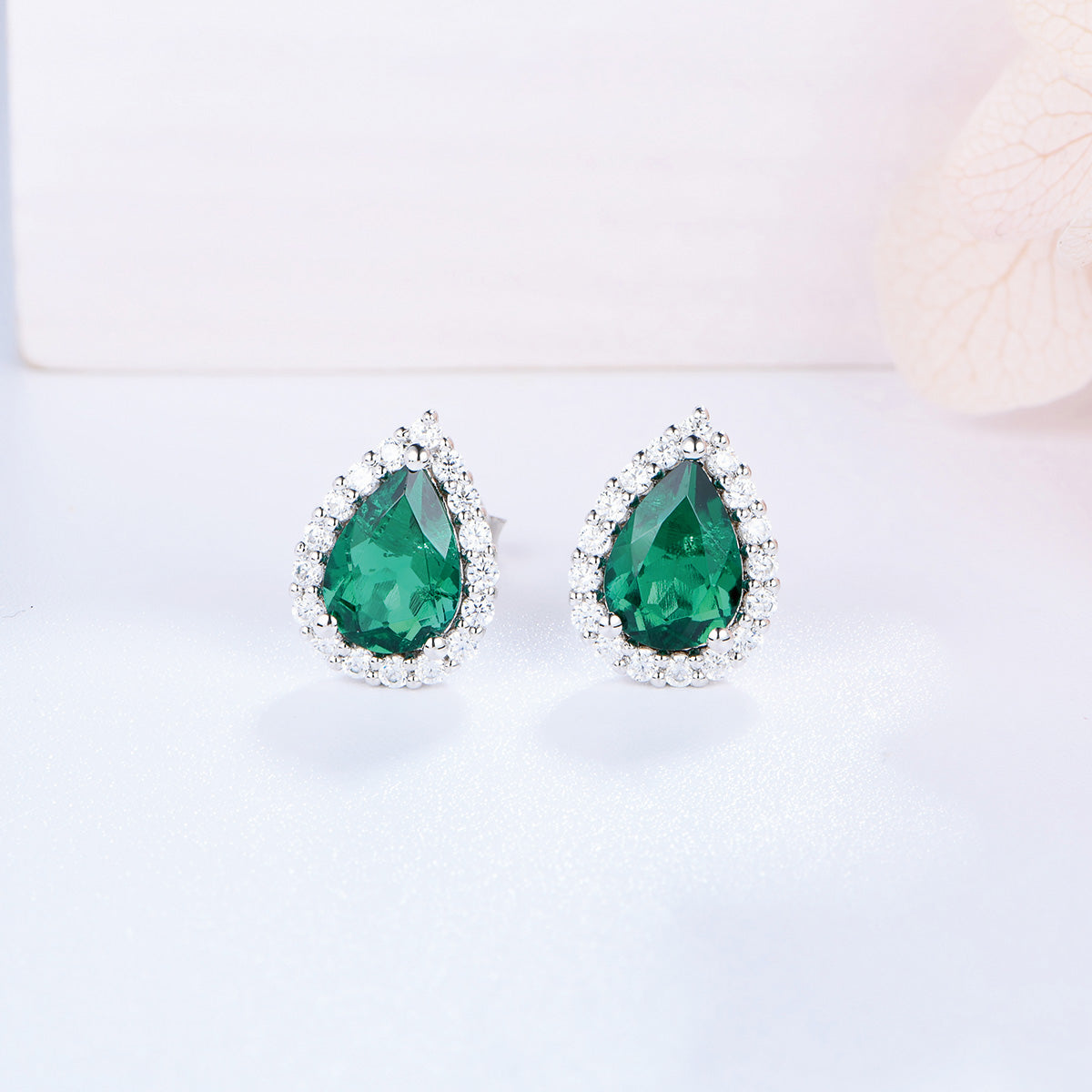 White Gold Pear Shape Full Stones Stud Earrings With Emerald Gem